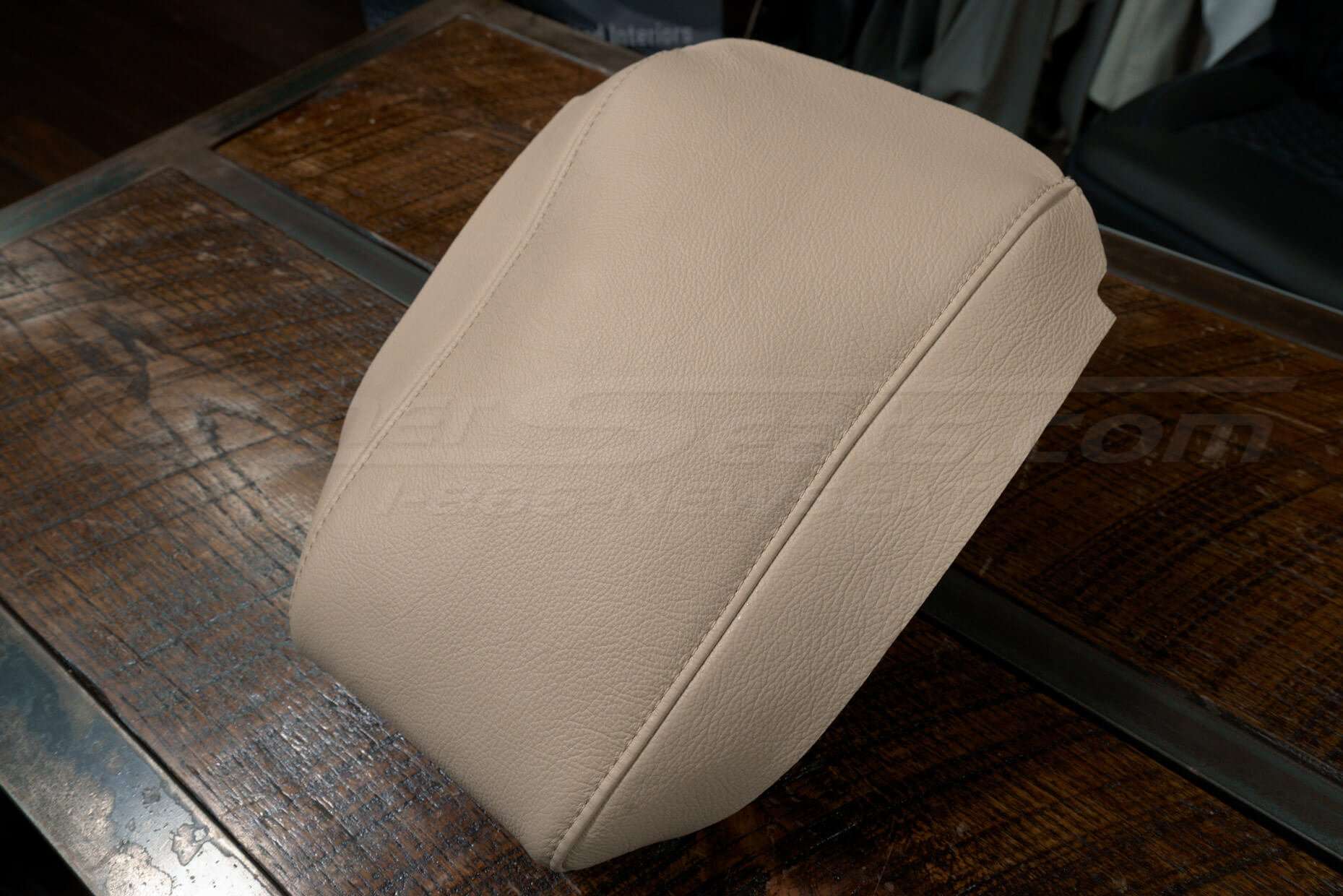 Top-down side view of Vanilla leather console cover for Lexus RX350