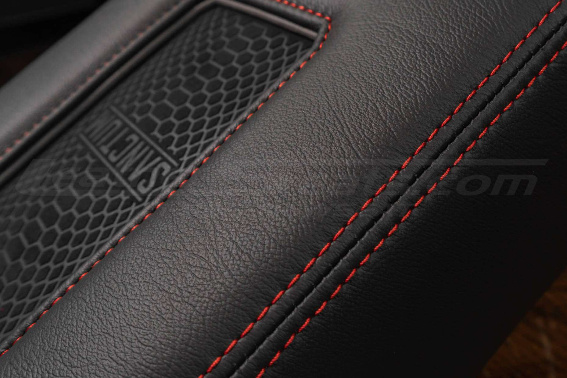 Contrasting Bright Red double-stitching on Wireless Charging Phone Console