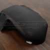 Flat side view of console lid cover contrasting stitching