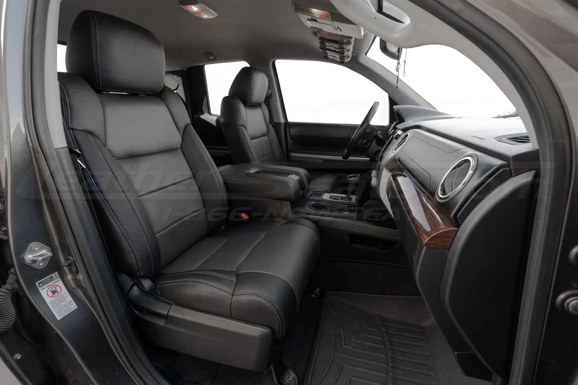 Passenger Toyota Tundra double cab with installed two-tone leather seats
