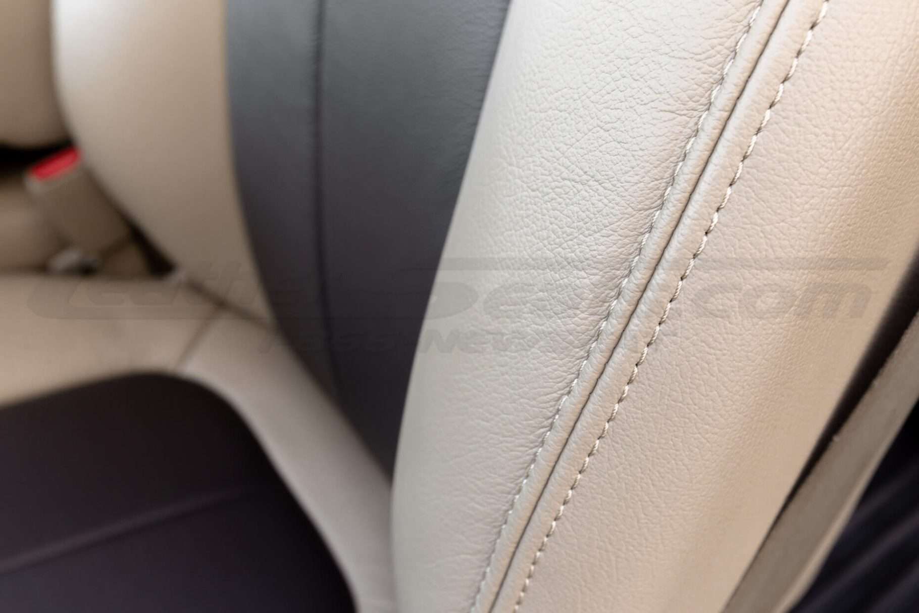 Matching Sandstone double-stitching on installed sandstone leather backrest