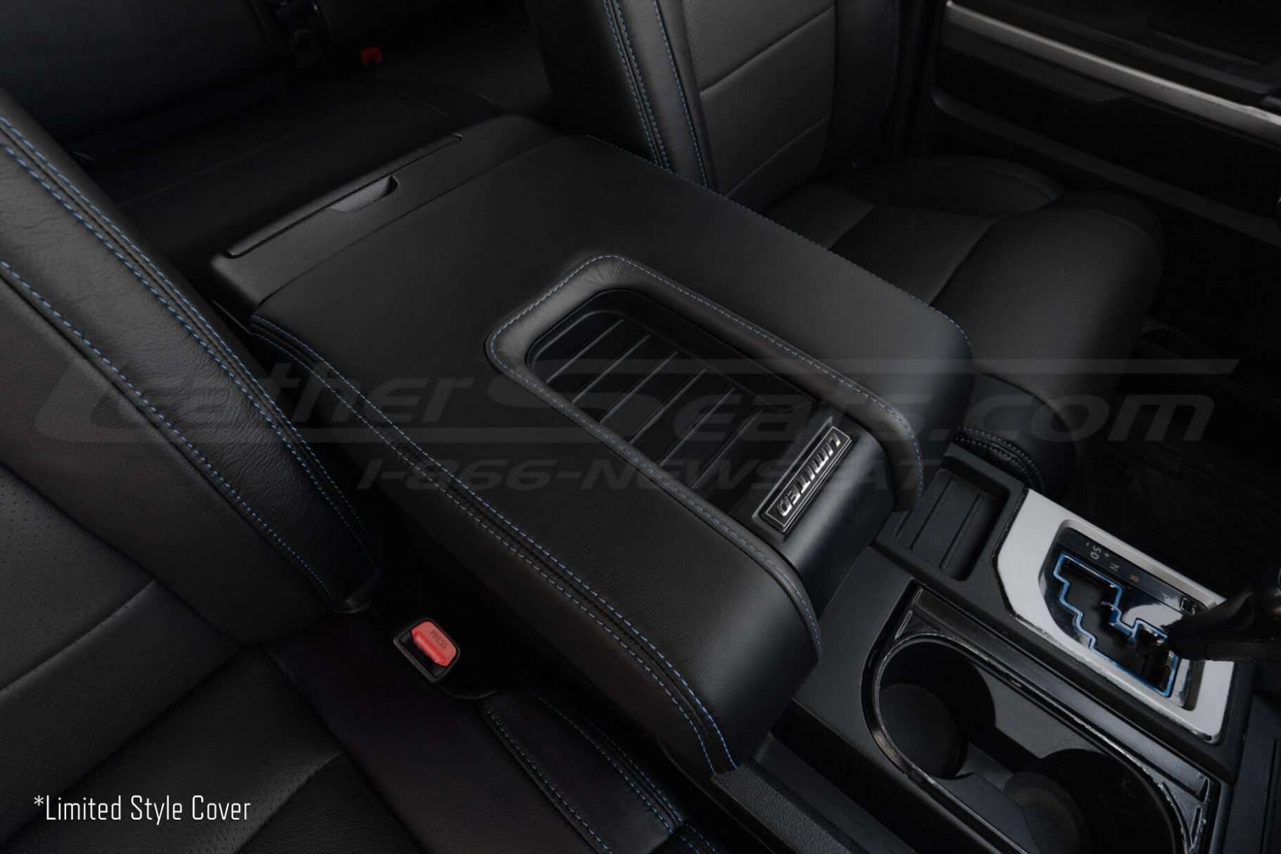 Passenger Side iew of leather console with contrasting stitching