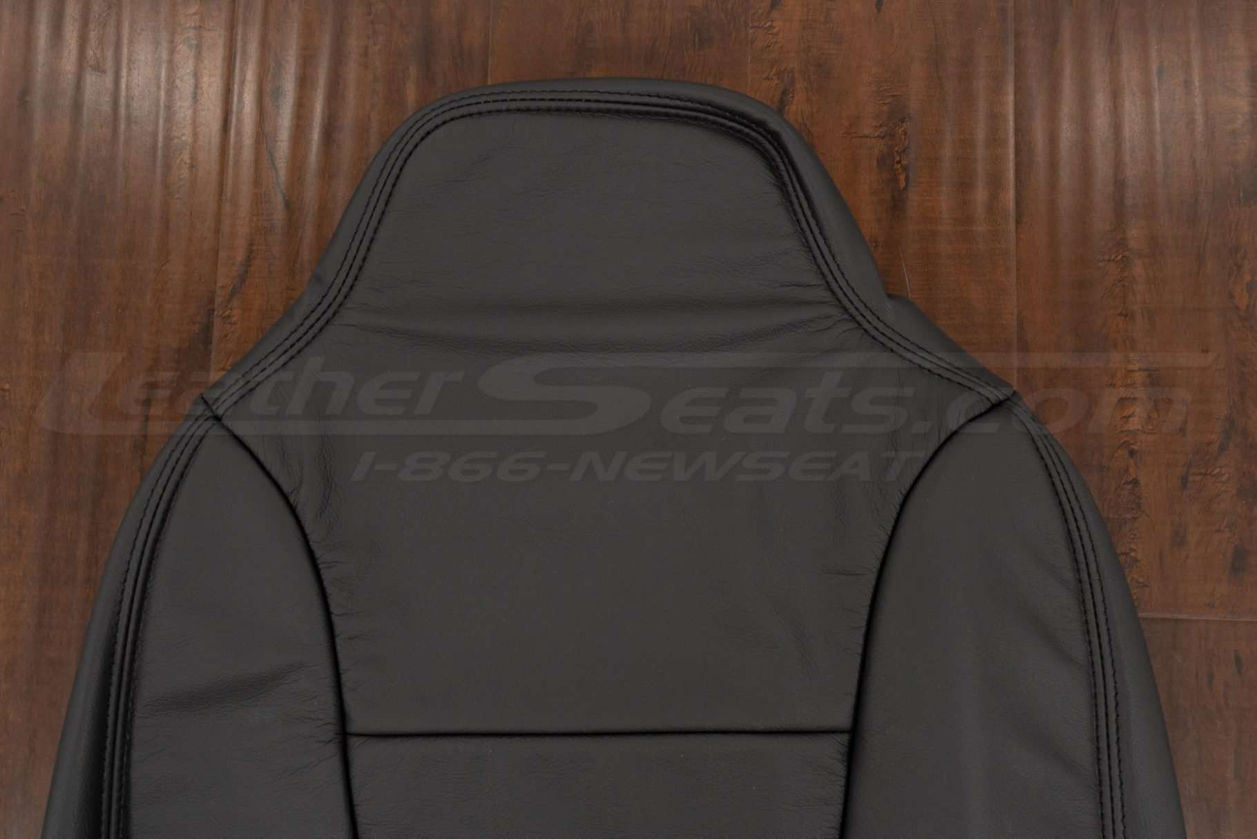 Upper section of front backrest upholstery
