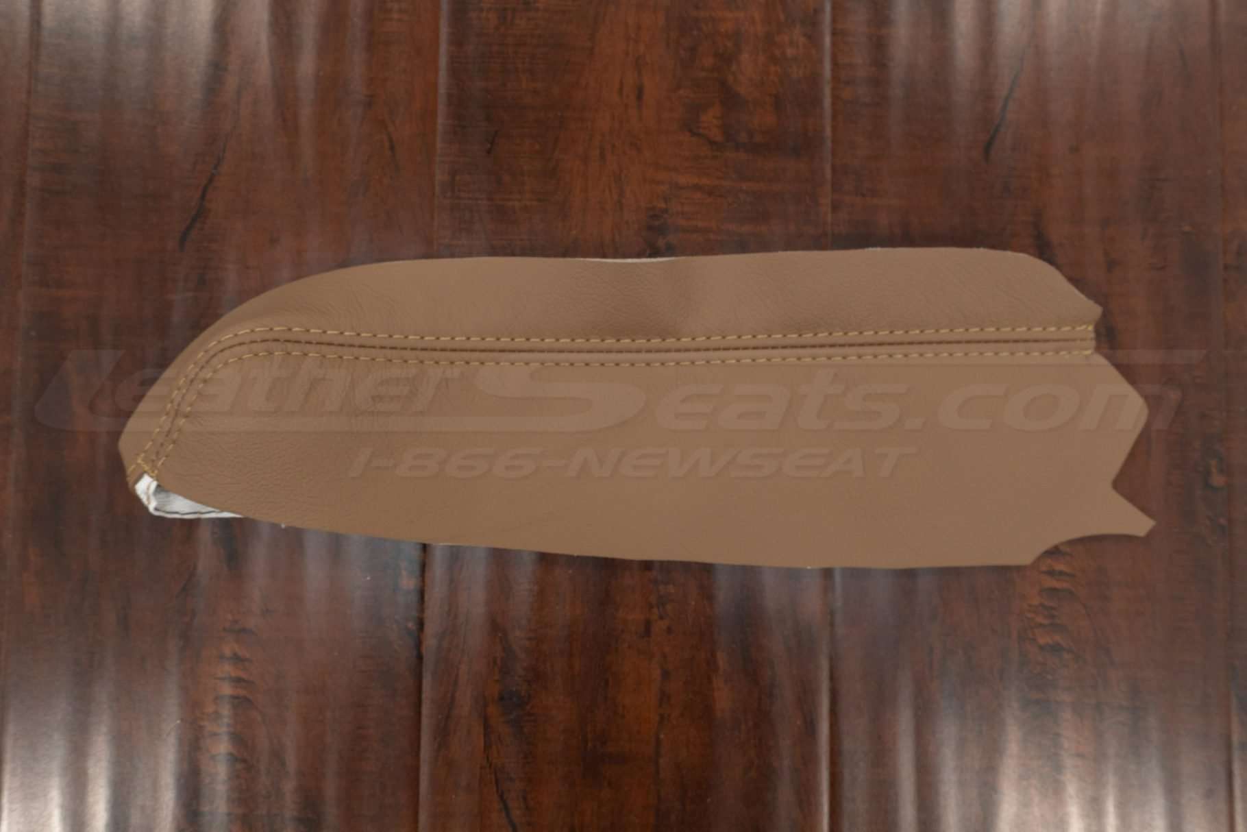 Flat close-up of single door armrest upholstery