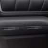 Front view of installed door armrest upholstery