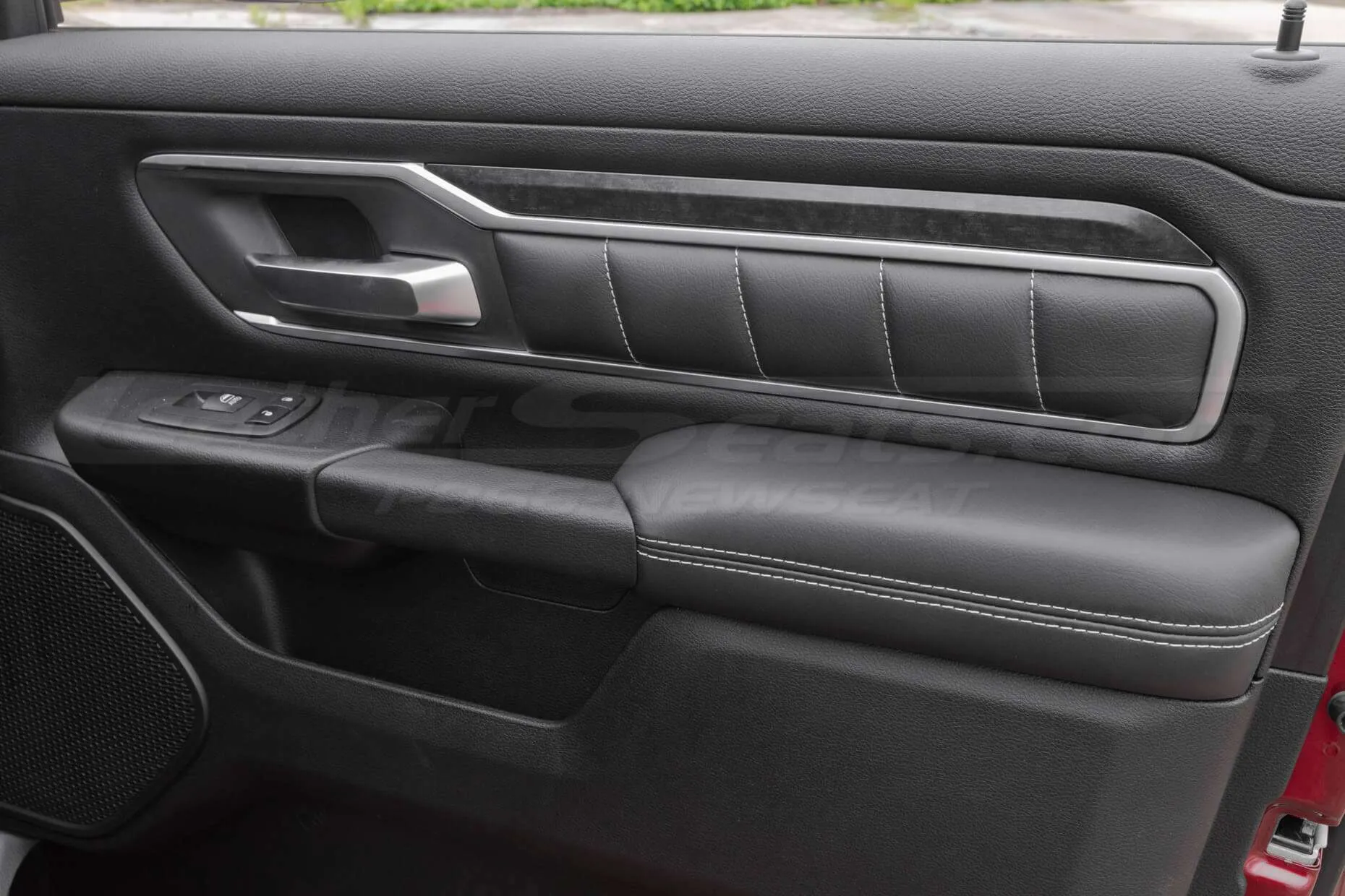 Dodge Ram custom leather door amrmrests and door panel inserts