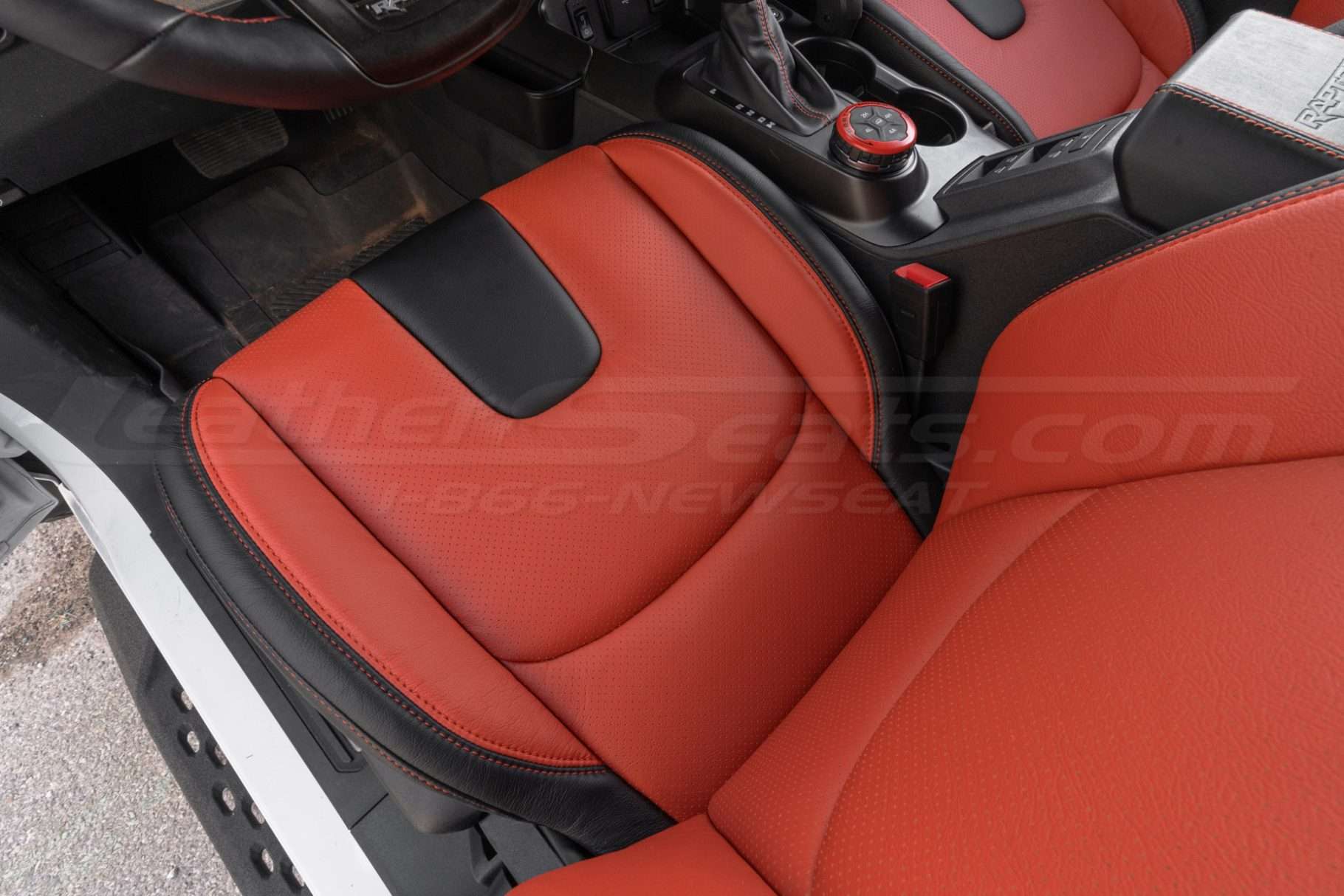 Top-down view of front driver seat with insert perforation