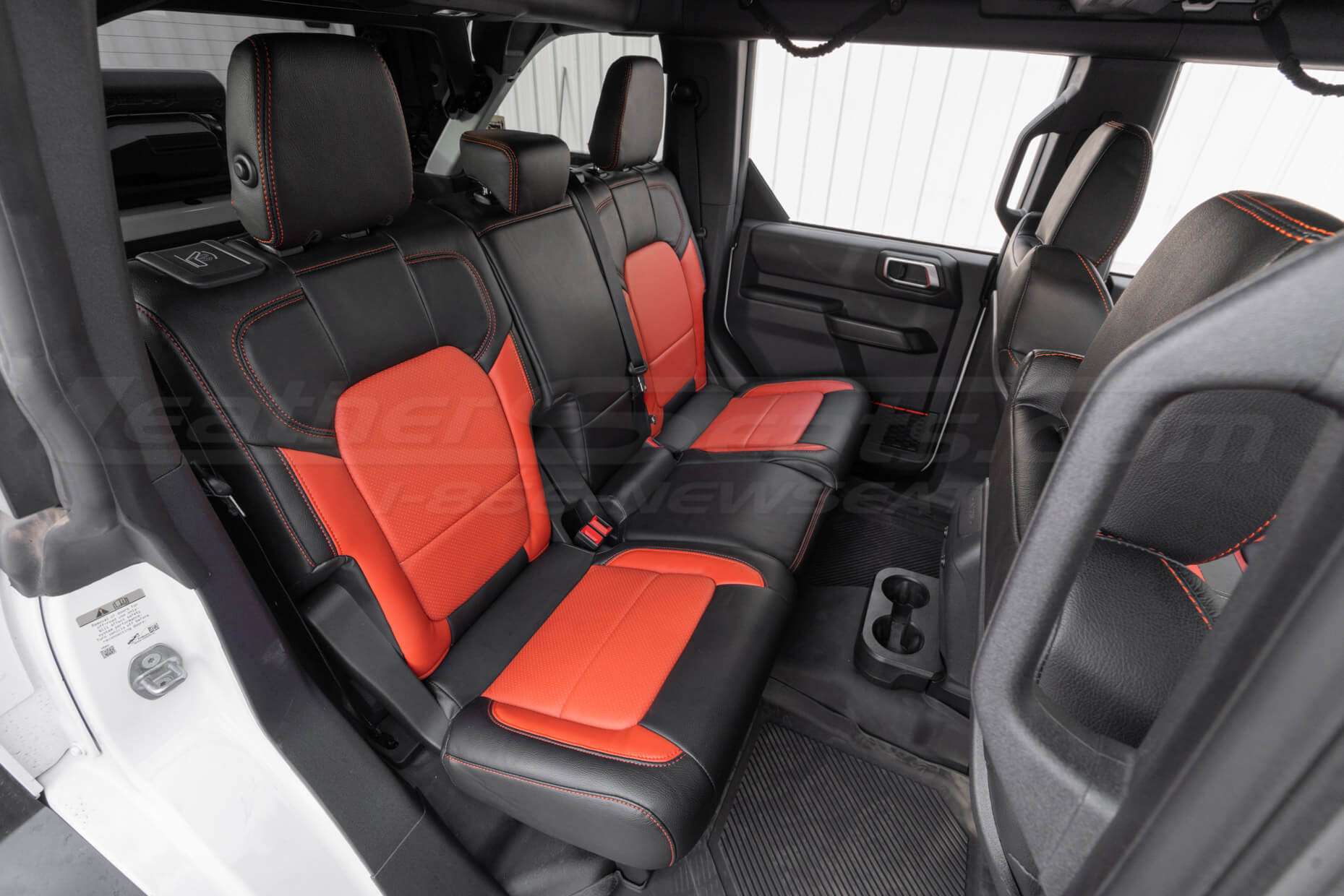 Forb Bronco Raptor with custom Black ad Tangerine leather seats - Rear seats passenger side