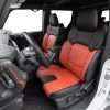 Custom Two-Tone Black and Tangerine leather seats with perforated inserts for 2023 Ford Bronco Raptor