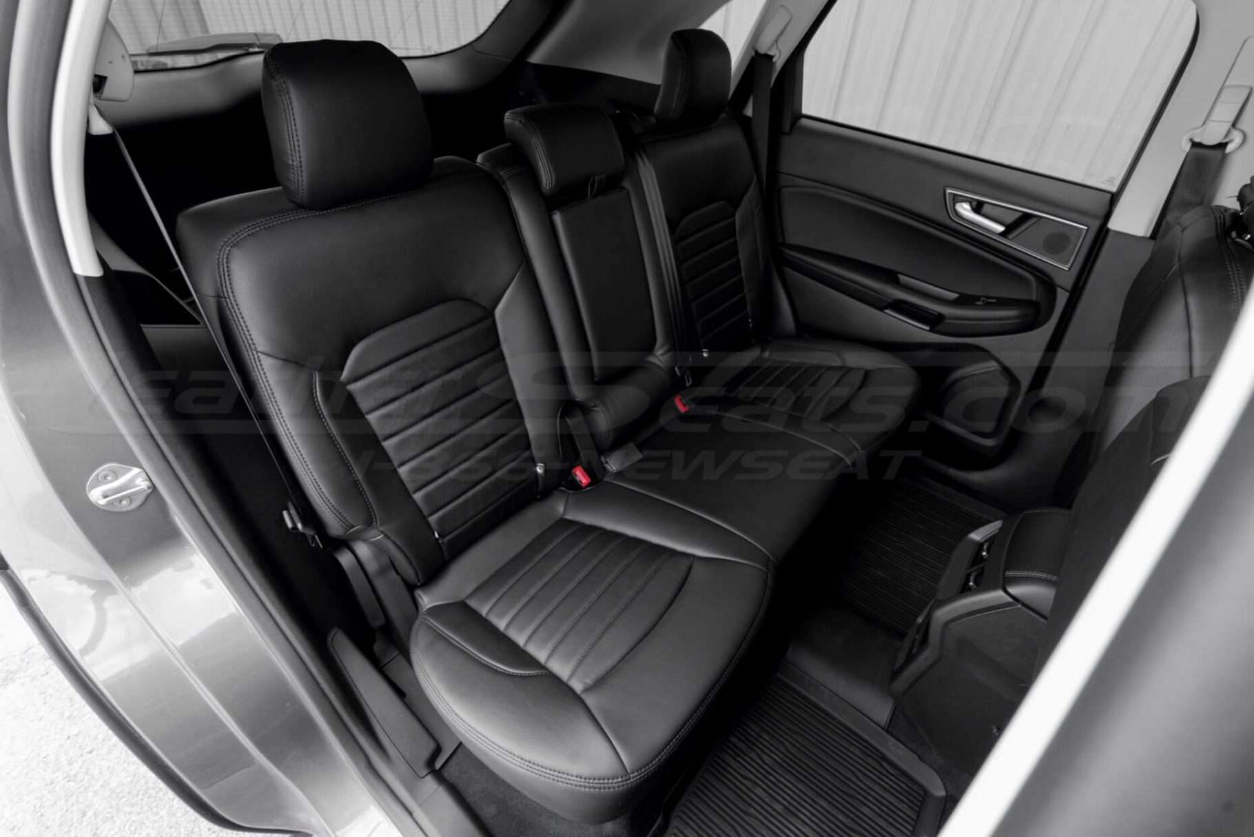 Installed Black leather seats from passenger side