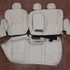 Nissan Rogue SV Rear seat upholstery with bolsters and Armrest - Oyster
