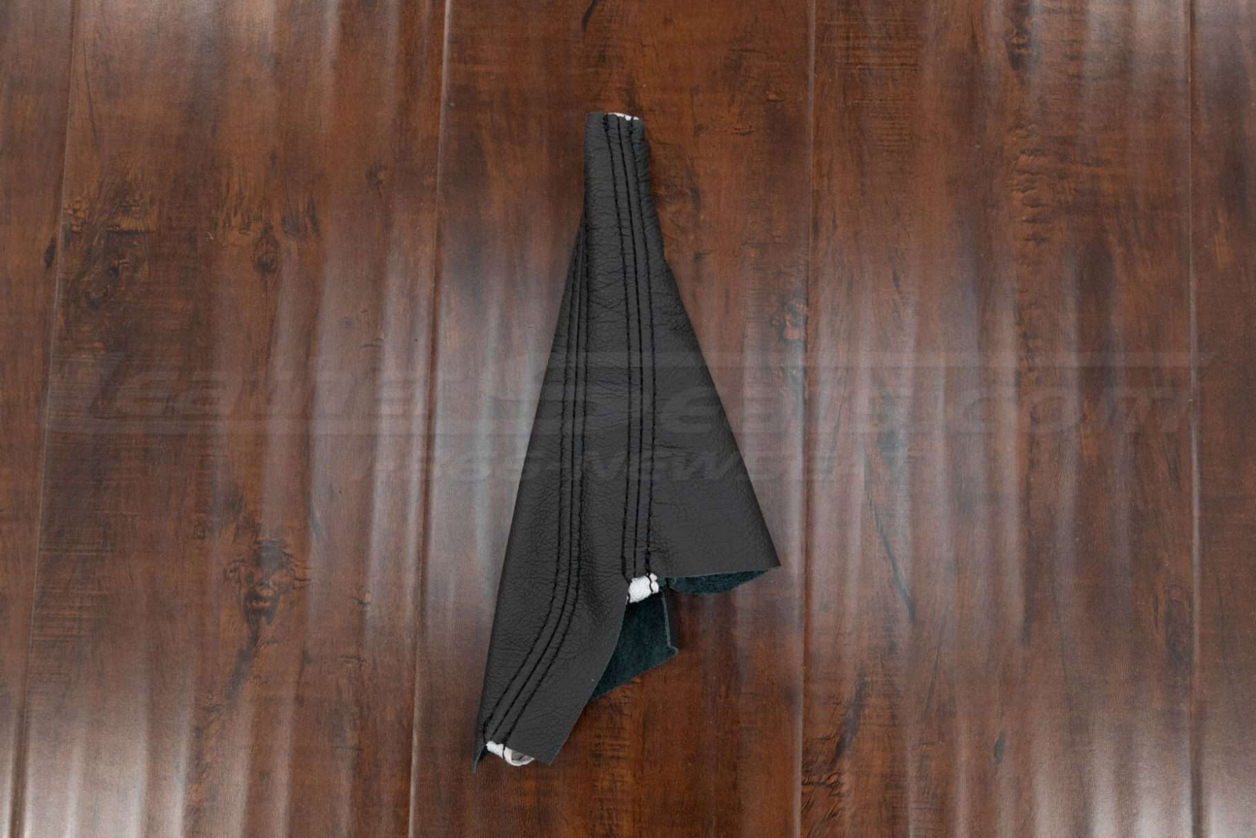 1991-1999 Mitsubishi 3000GT leather e-brake boot upholstery flat lay