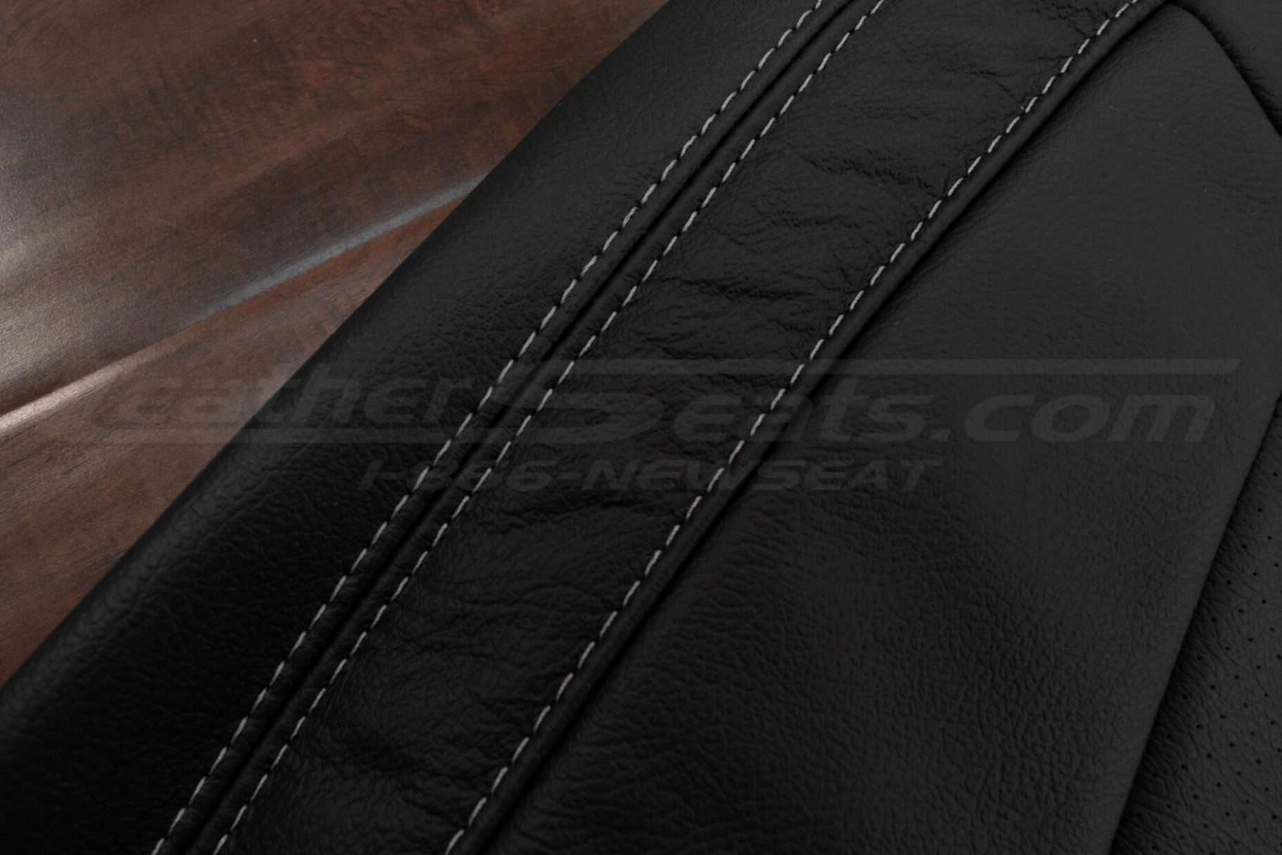 Light Grey double-stitching on Black leather