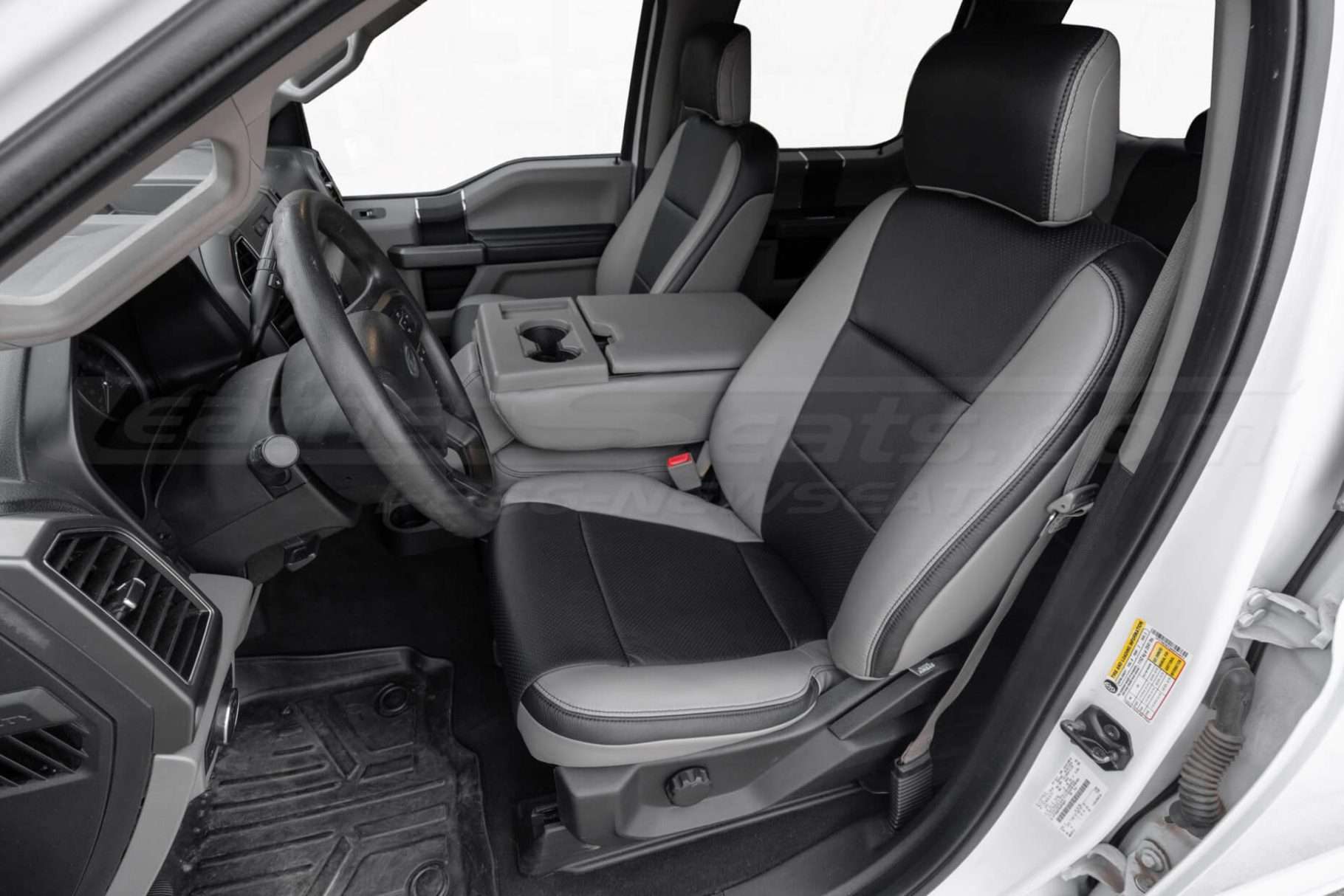 Alternative view of installed leather on front driver seat with folded down jumpseat