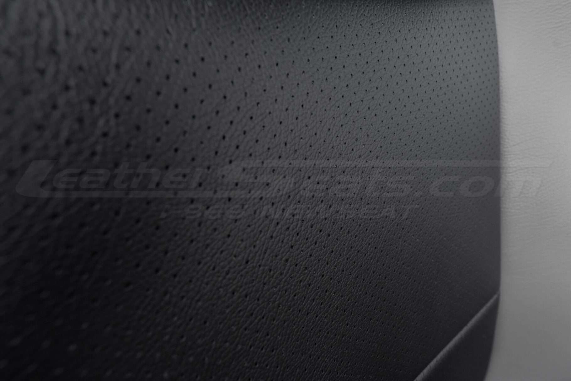 Black leather perforated Body close-up
