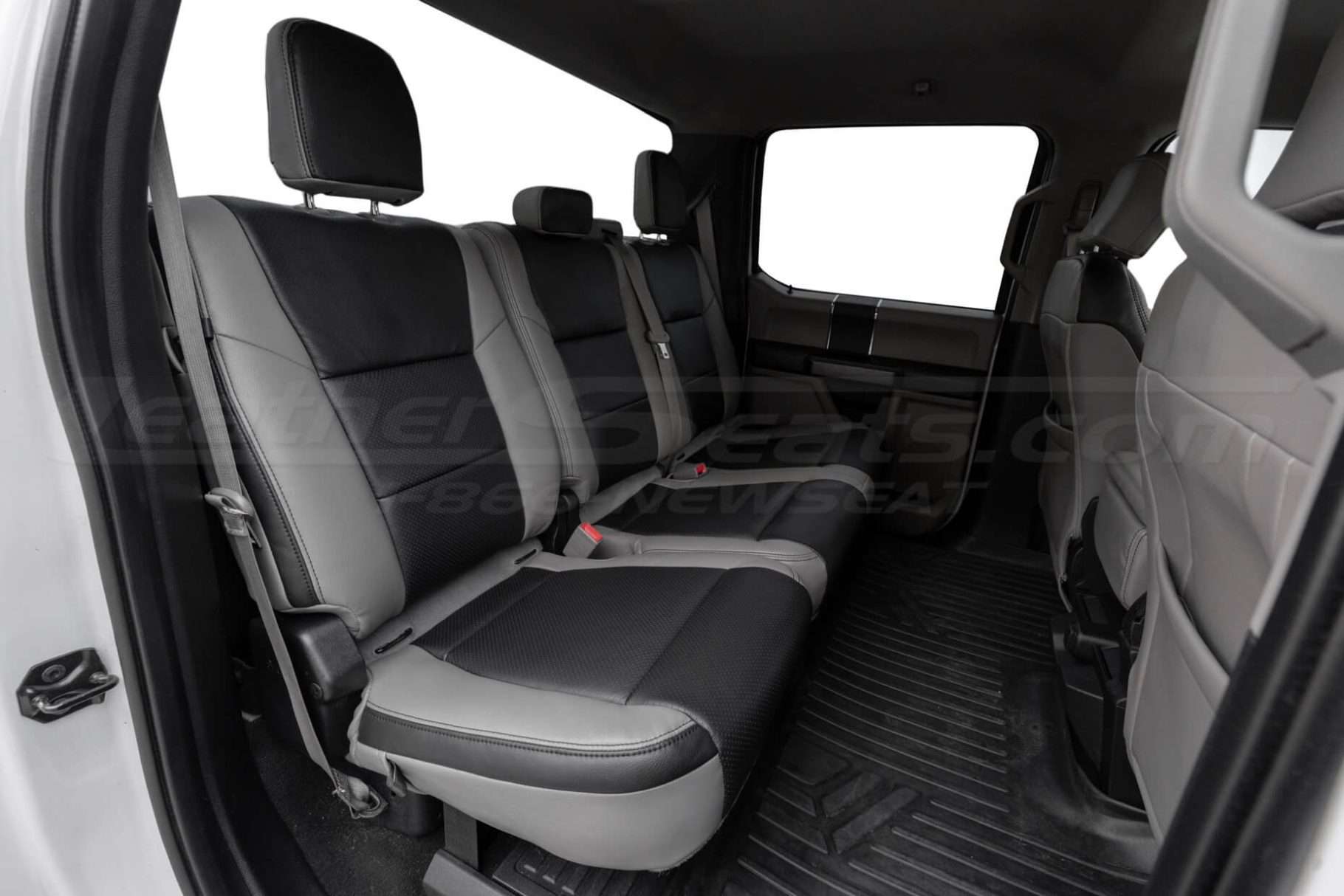 Ford Superduty with custom Stone and Black leather interior - Rear seats from passenger side