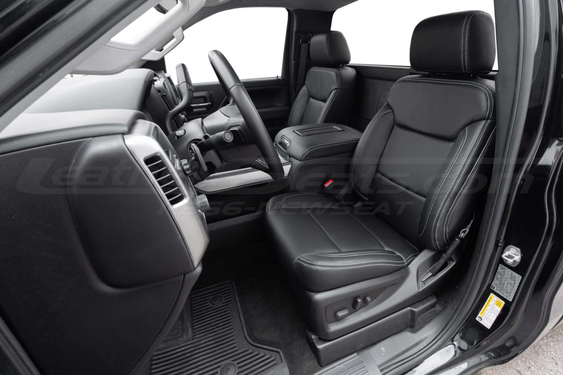 2015 Chevrolet Silverado Regular Cab with Black leather seats, perforated body and contrasting silver stitching