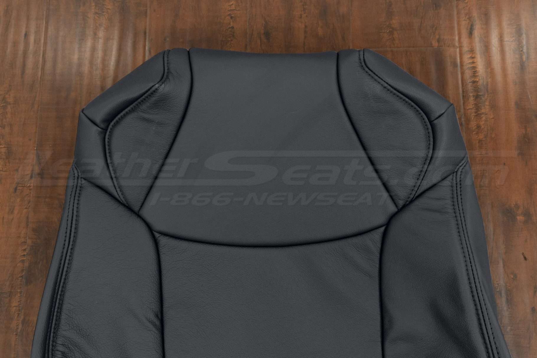 Upper section of leather backrest upholstery