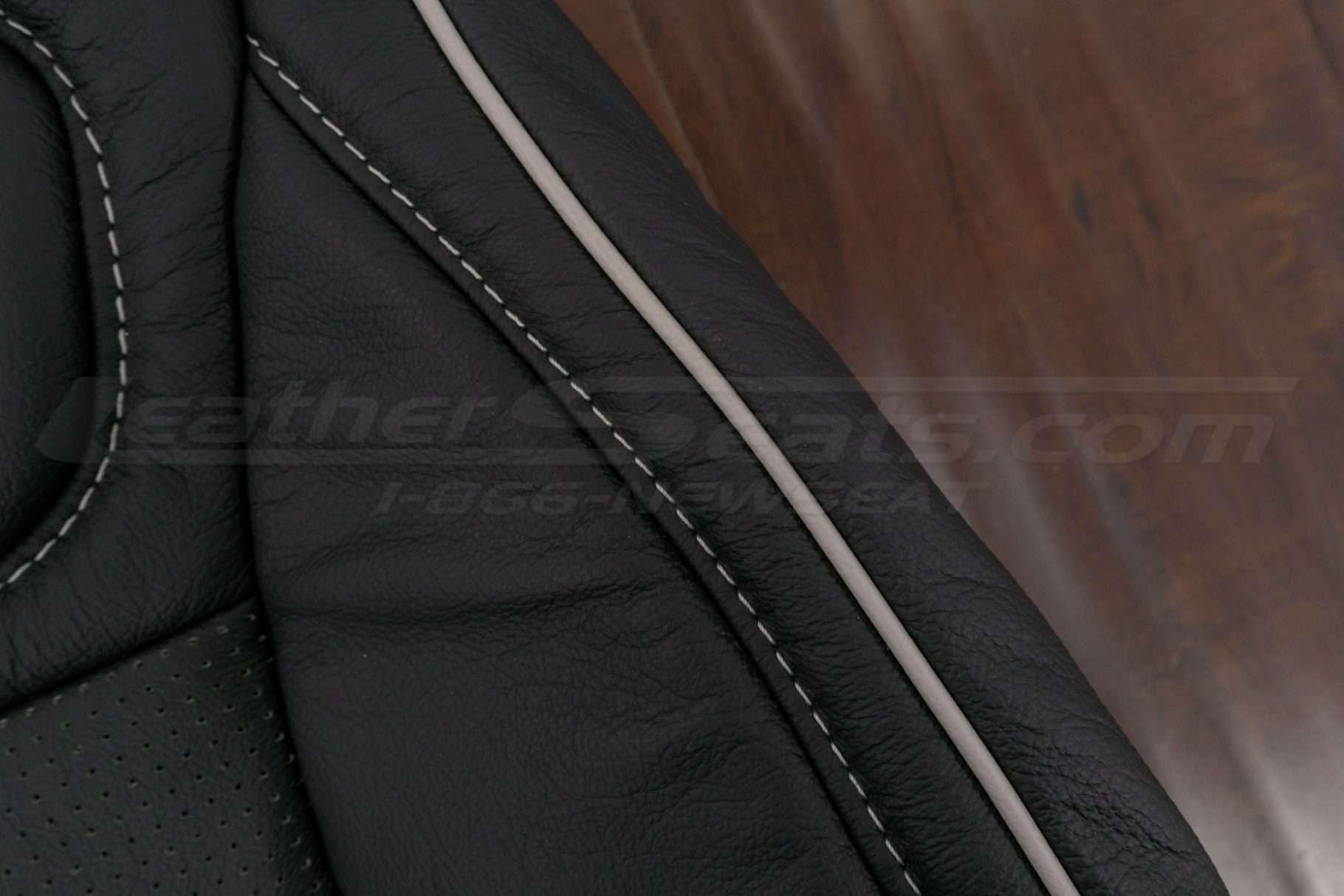 Contrasting Dove Grey Piping on Black leather