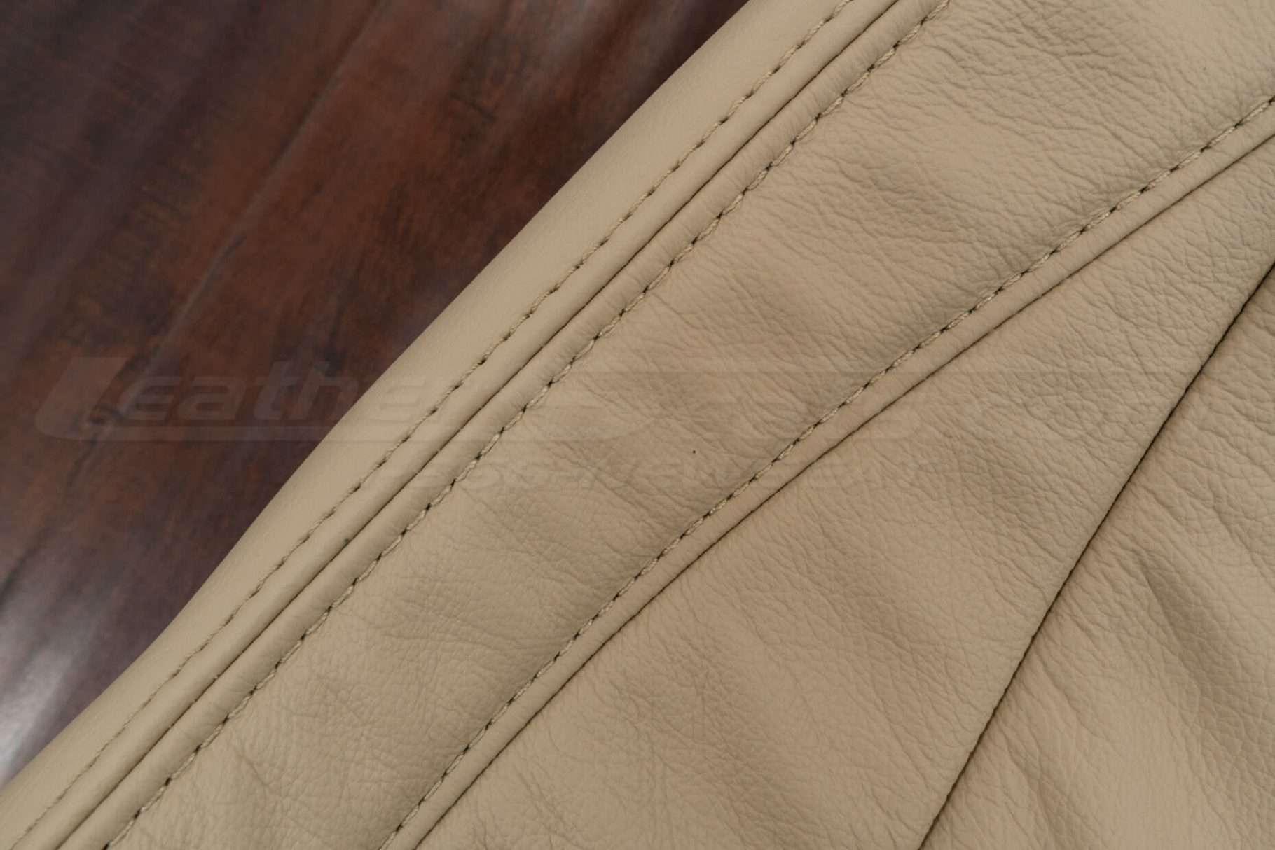 Matching Parchment double-stitching on Parchment leather backrest