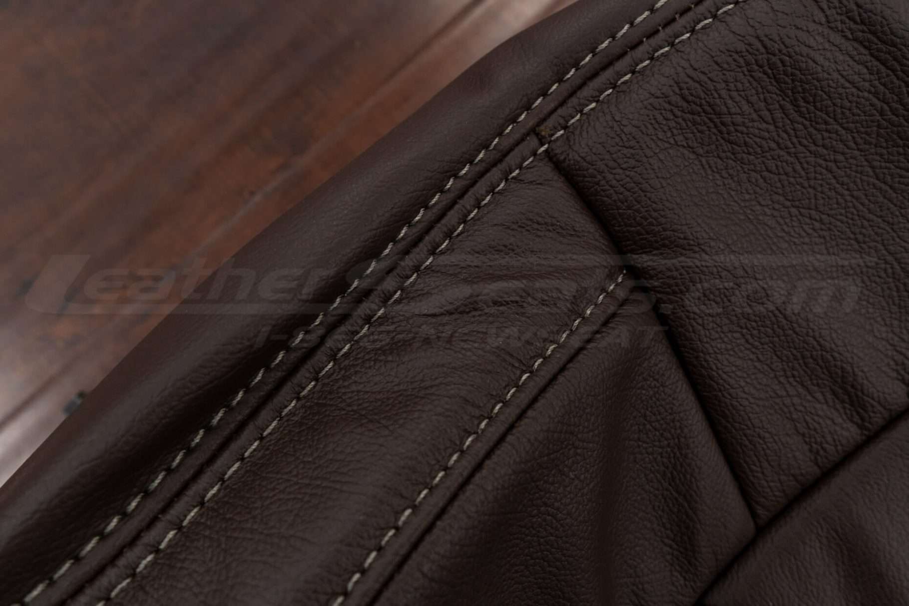 Contrasting Fawn double-stitching on Coffee leather