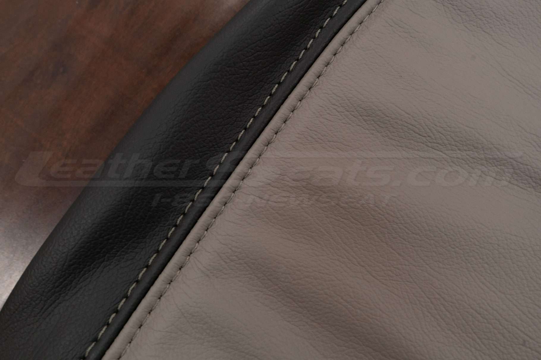 Puddy double-stitching on Dark Graphite and Puddy leather