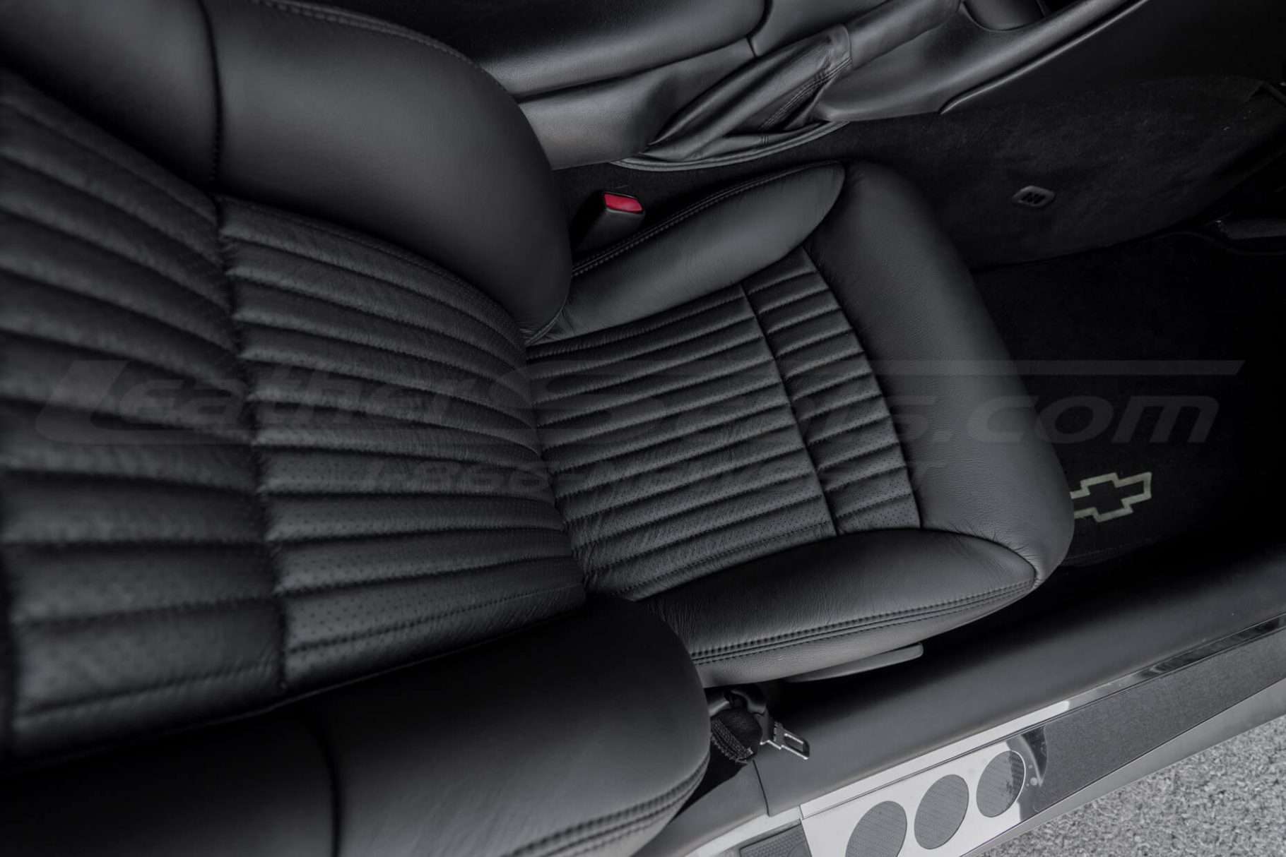 Top down view of C5 Corvette seat with perforated insert sections