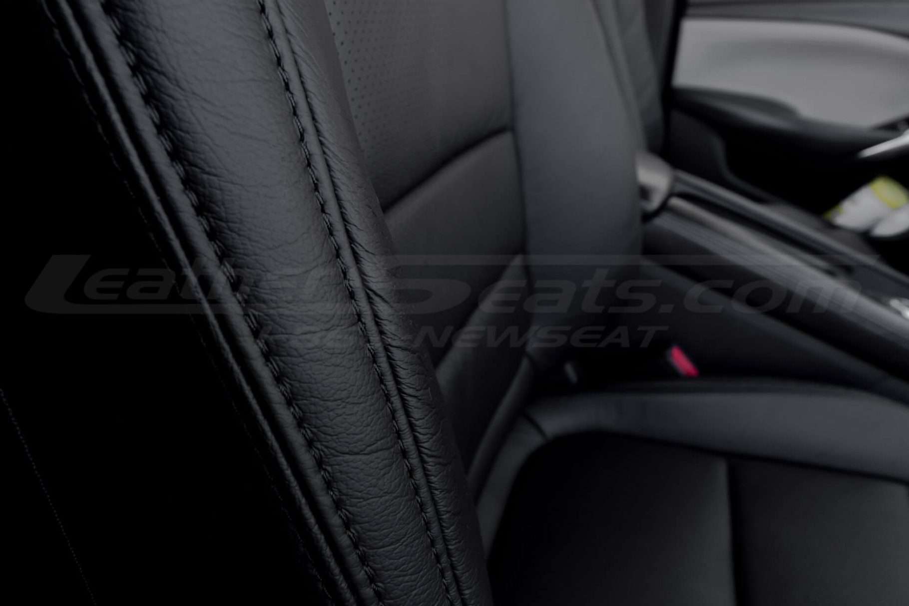 Black double-stitching on Black leather backrest