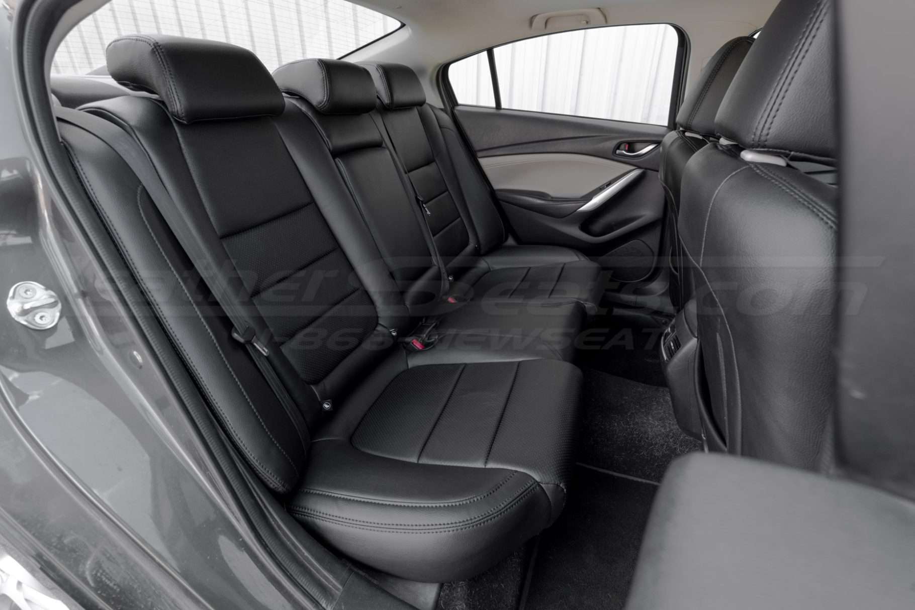 Mazda 6 with custom black leather seats - Rear seats passenger side