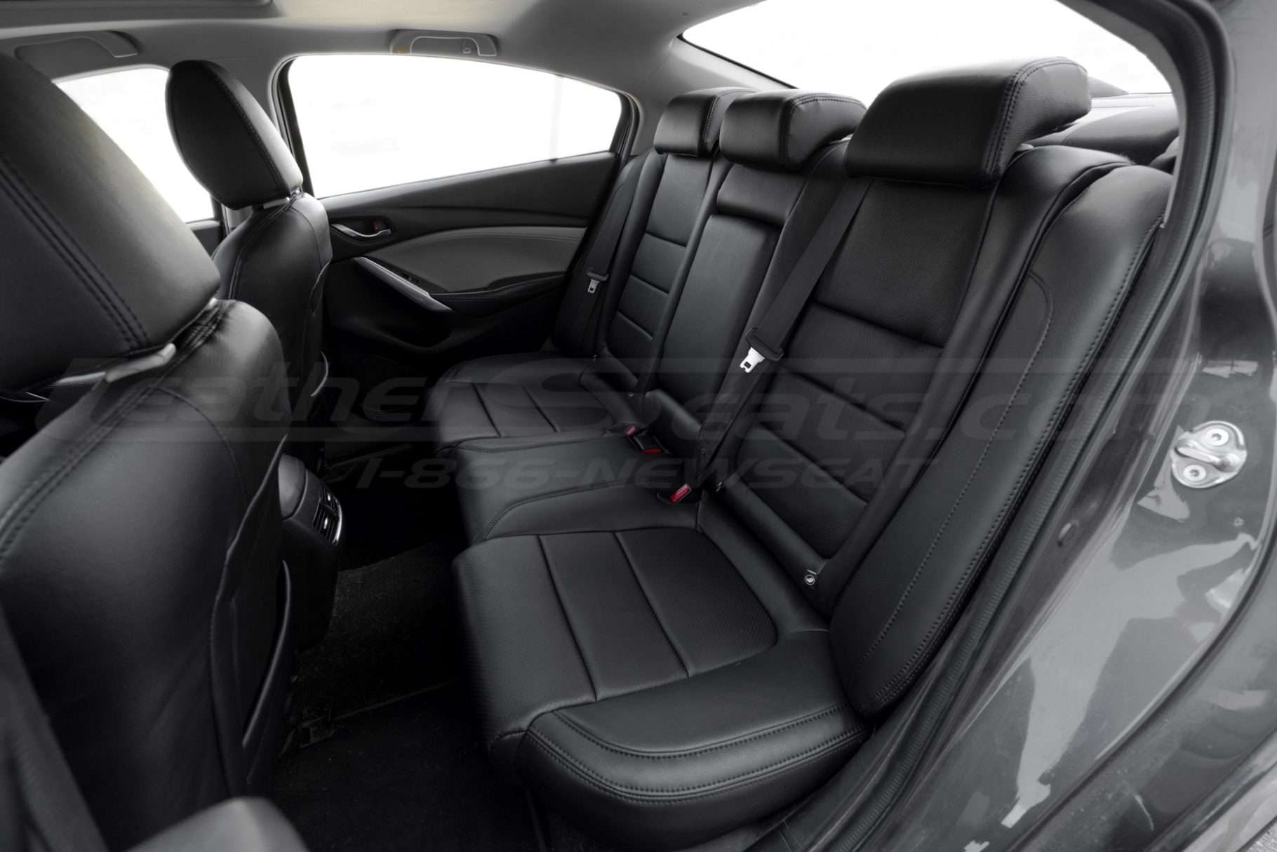 Installed black leather rear seats - Driver side