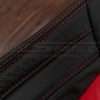 Contrasting bright Red stitching on Black leather