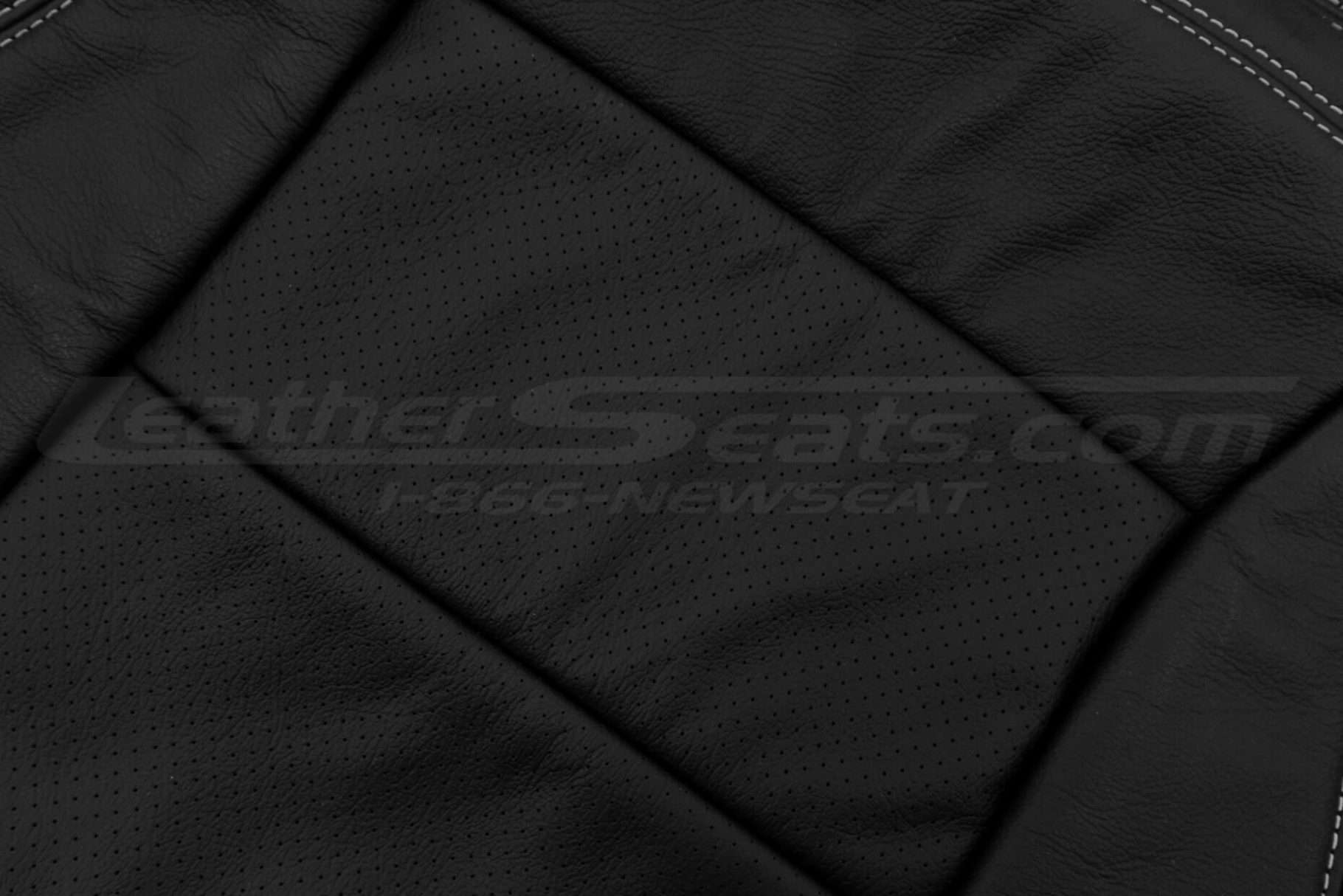 Black leather insert perforation close-up