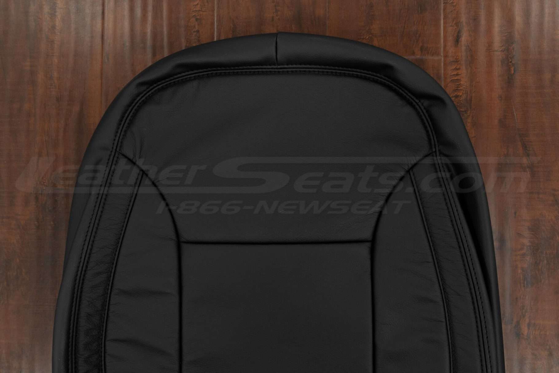 Upper section of Black backrest upholstery