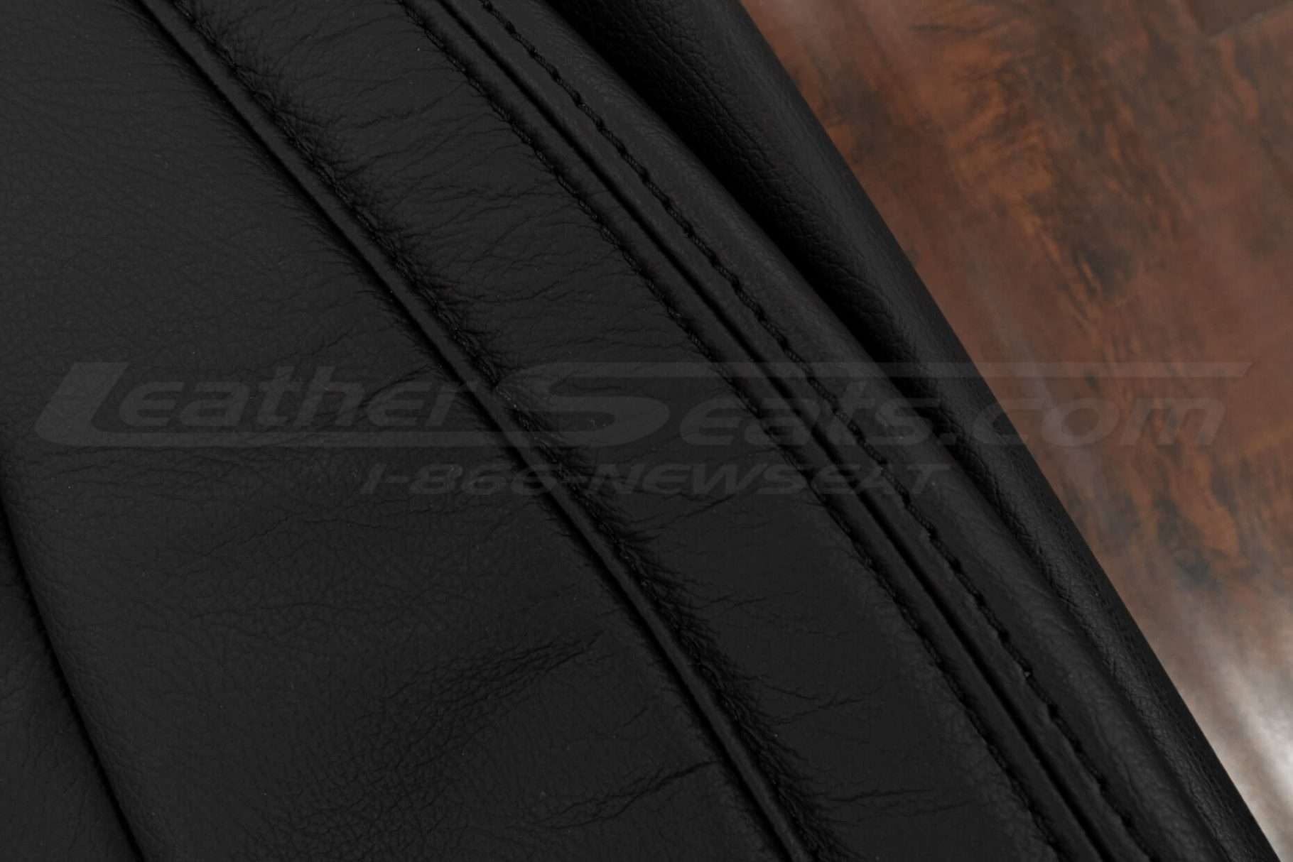 Black double-stitching on Blak leather