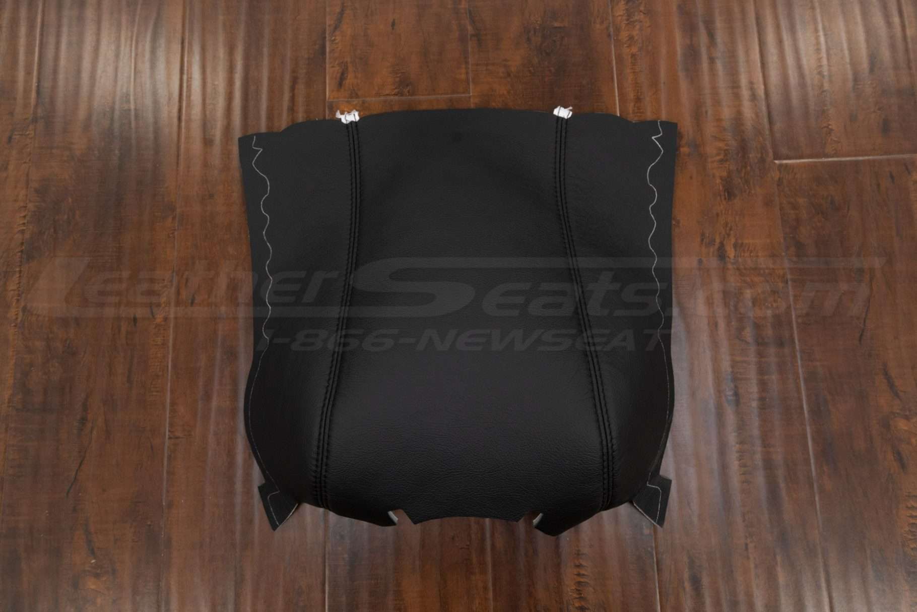 Top-down view of leather upholstery for Ford truck consoles