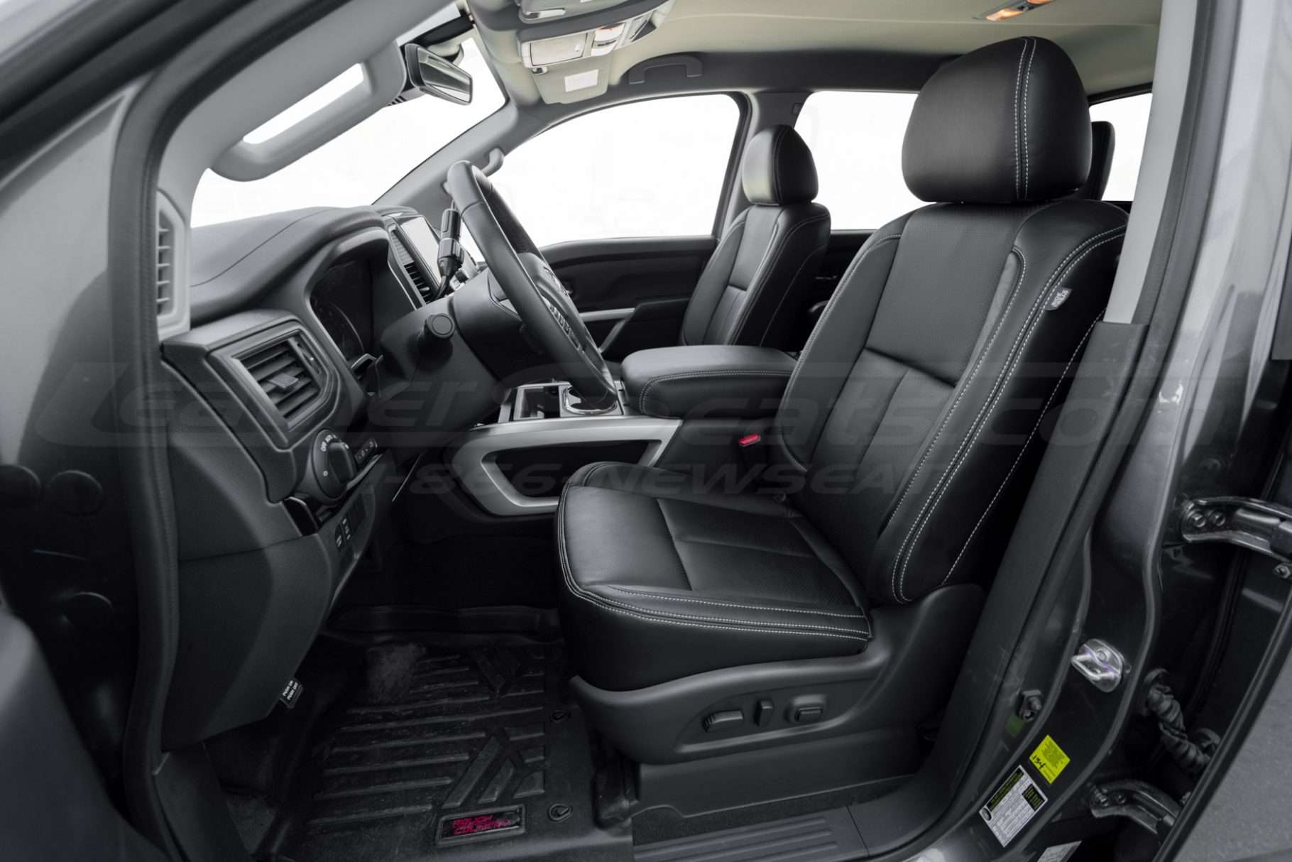 Alternative view of front driver sat with black leather itnerior