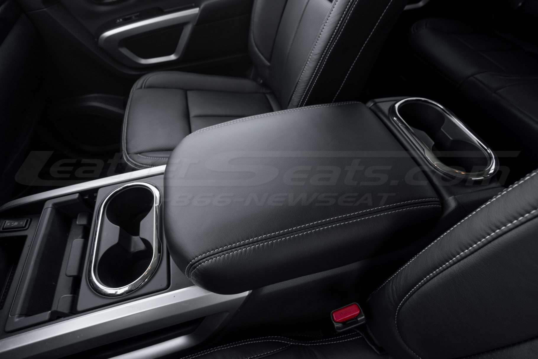 Nissan Titan Black console lid cover with silver stitching