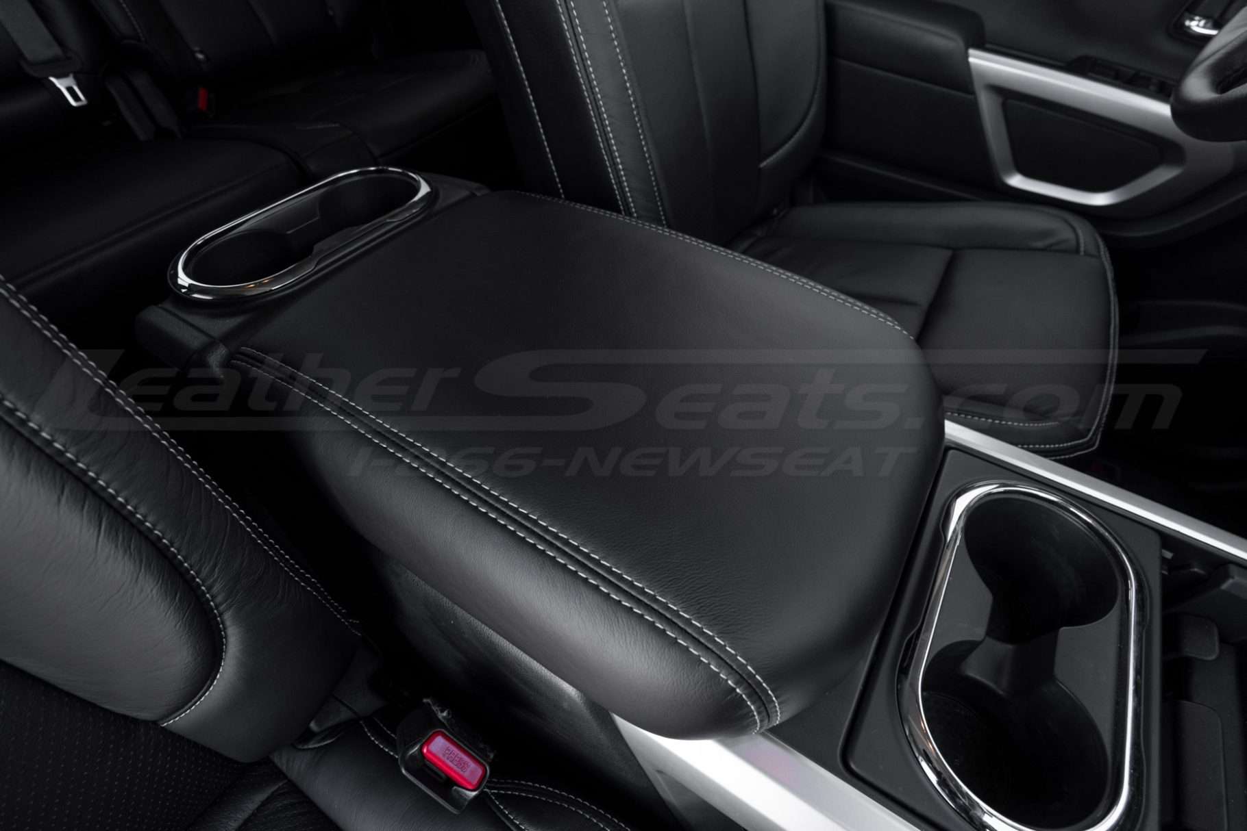 Close-up of contrasting silver stitching