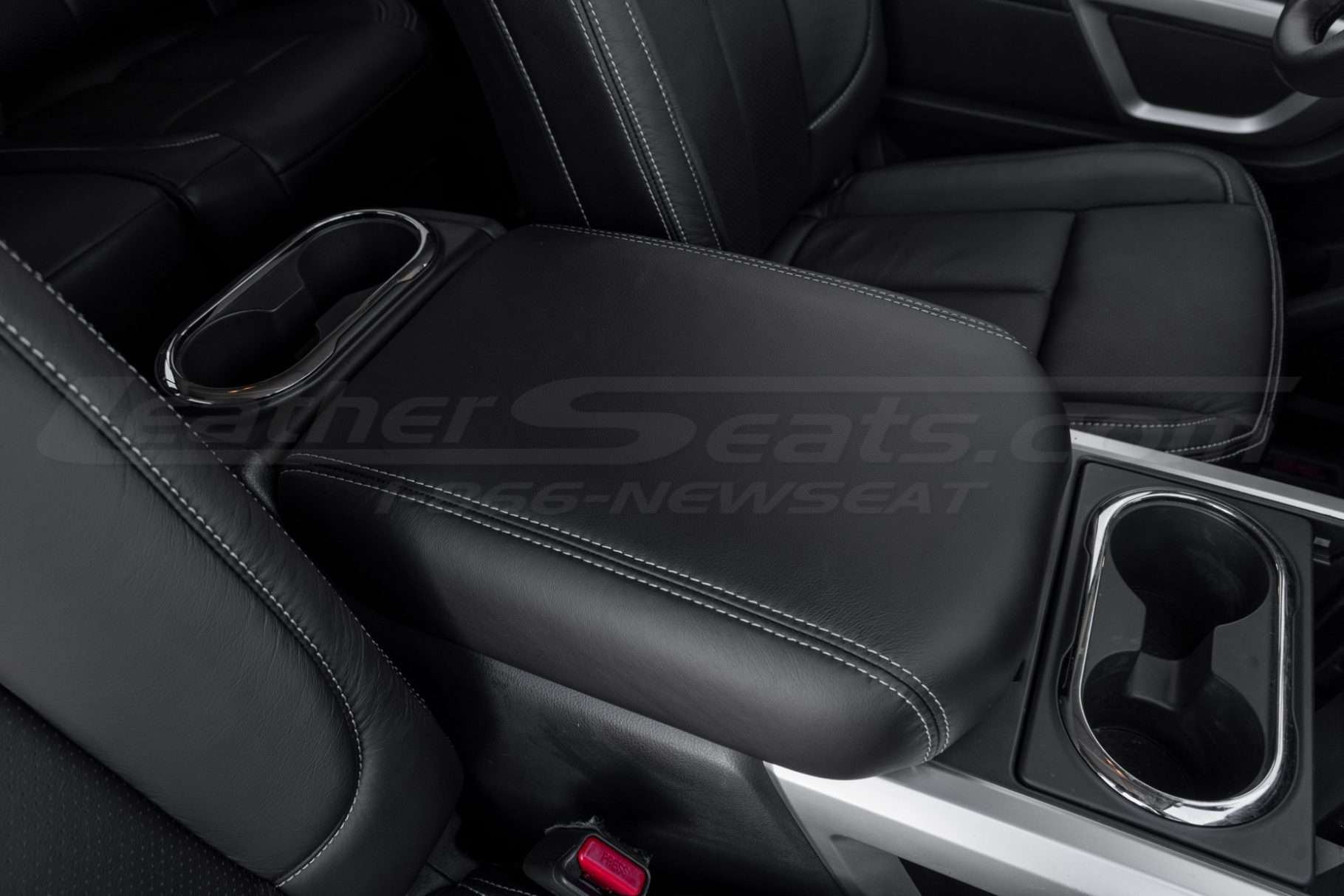 Black leather console lid with Silver stitching - Passenger side
