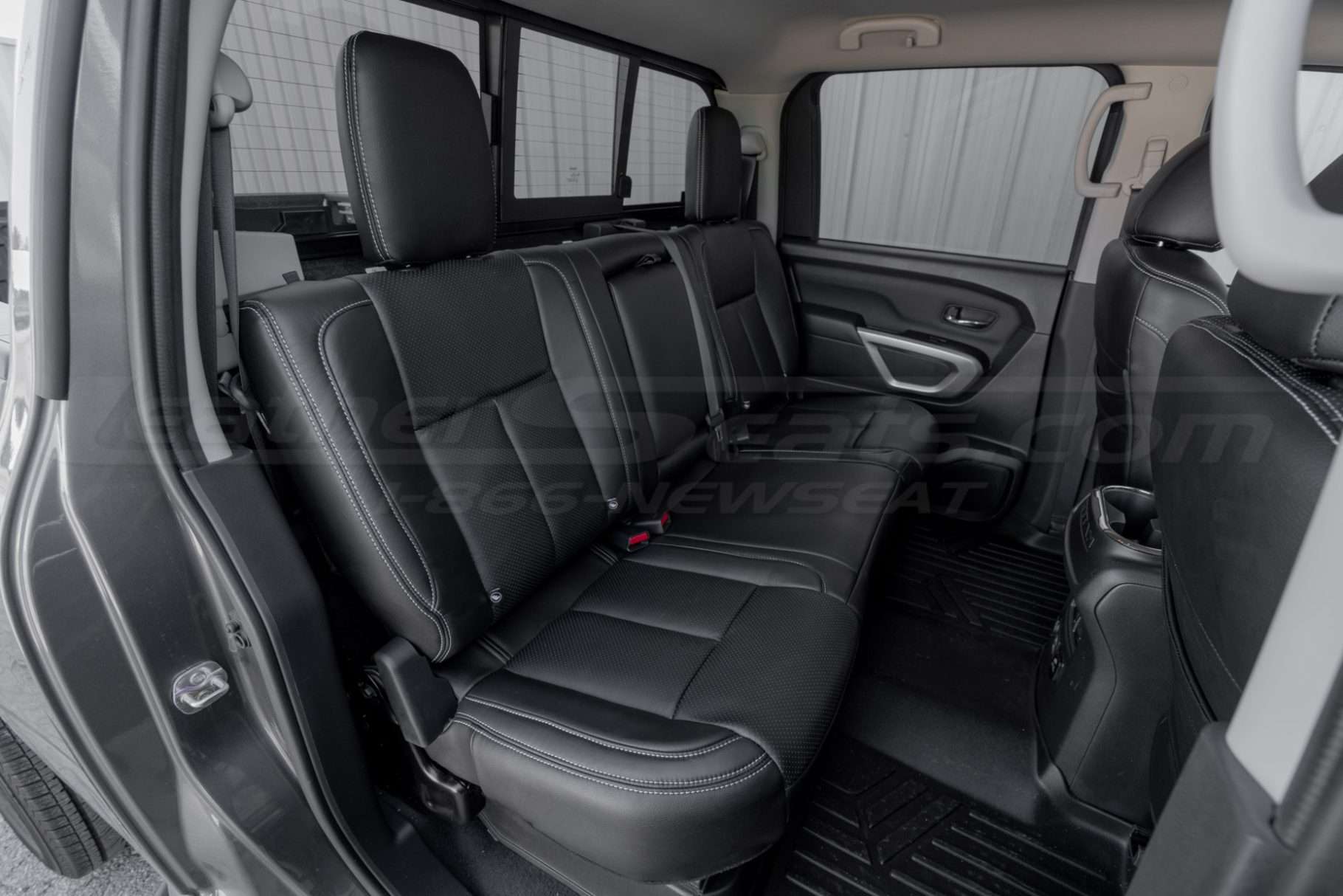 Nissan Titan with custim installed rear leather seats in Black leather