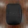 Top-down flat view of black console lid cover upholstery