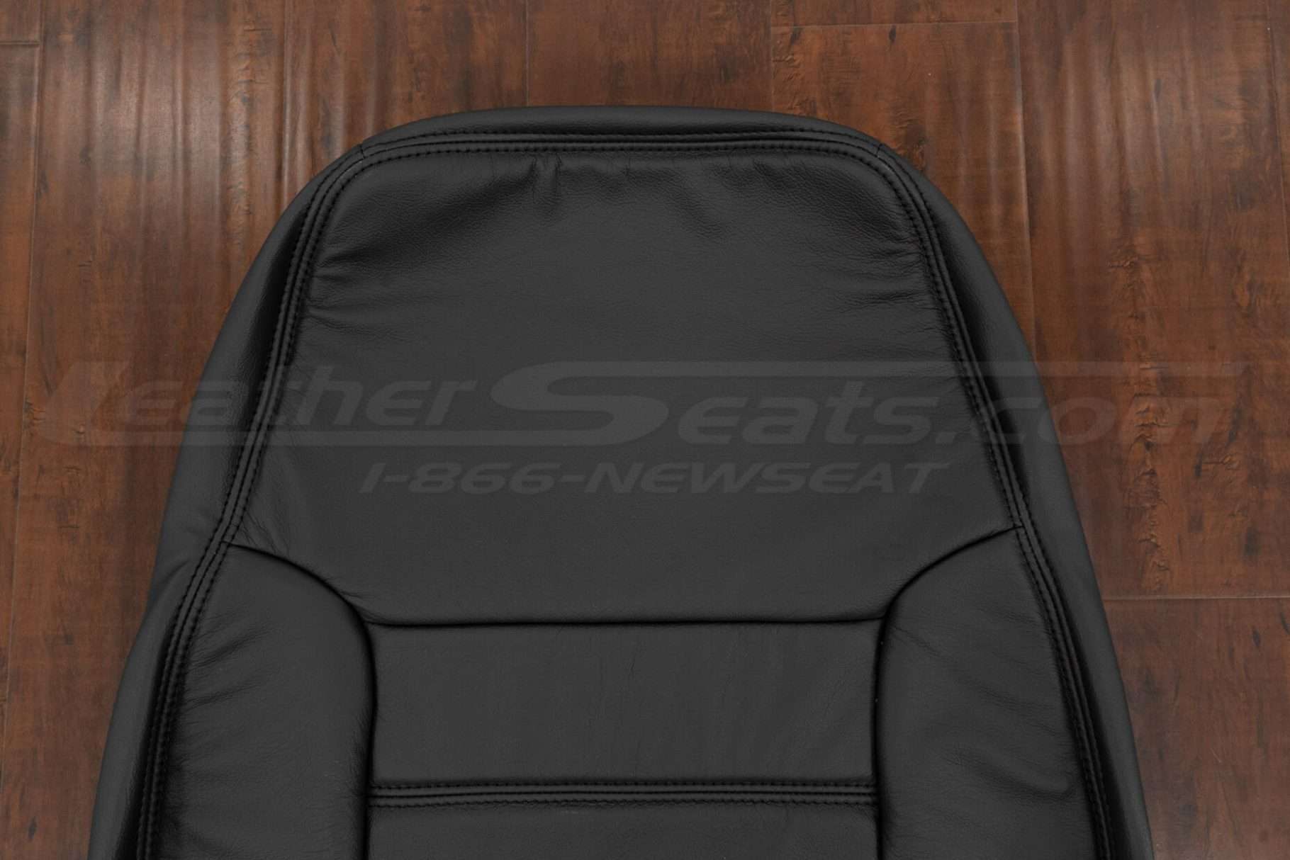 Upper section of front backrest upholstery