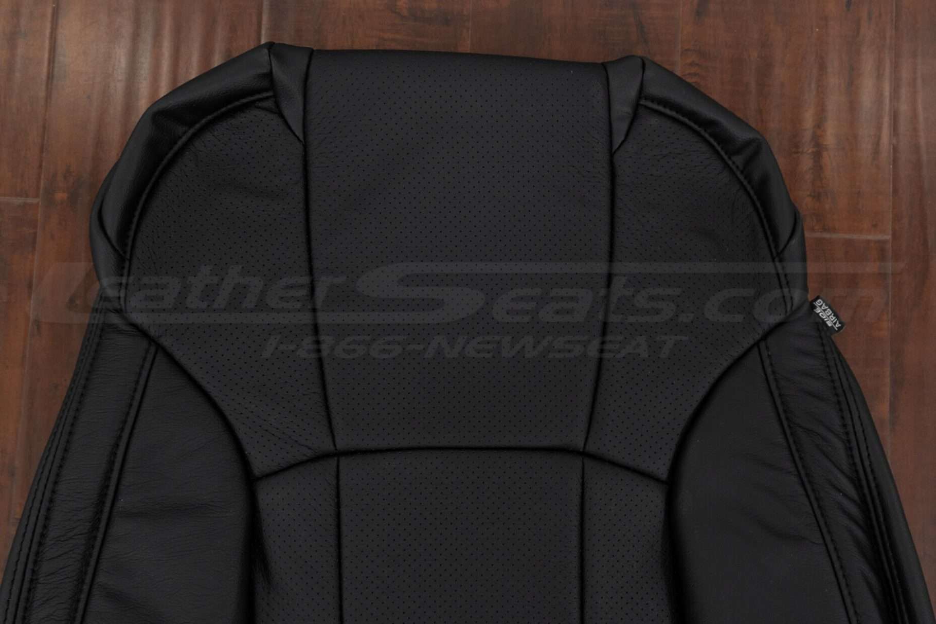 Upper section of backrest upholstery