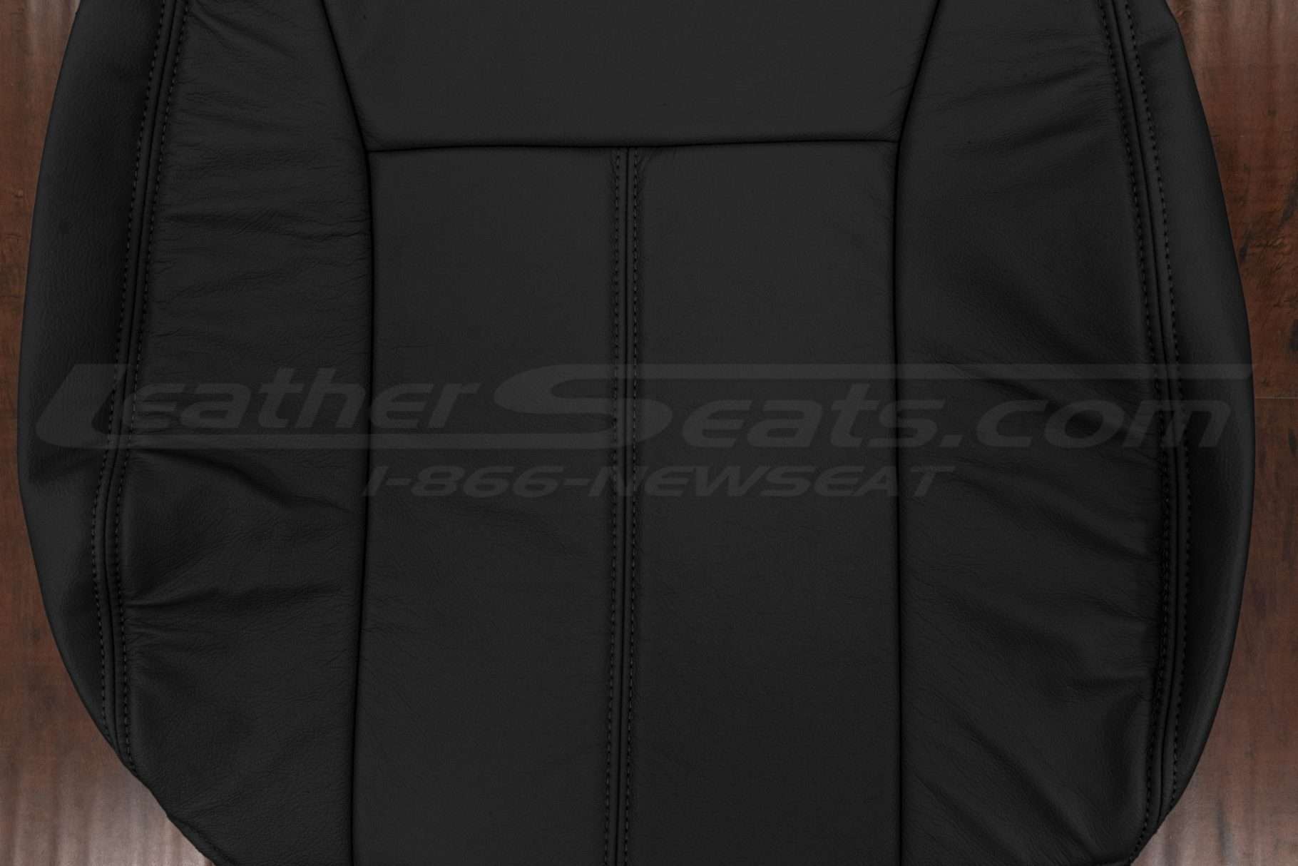 Black insert sectionof backrest upholstery