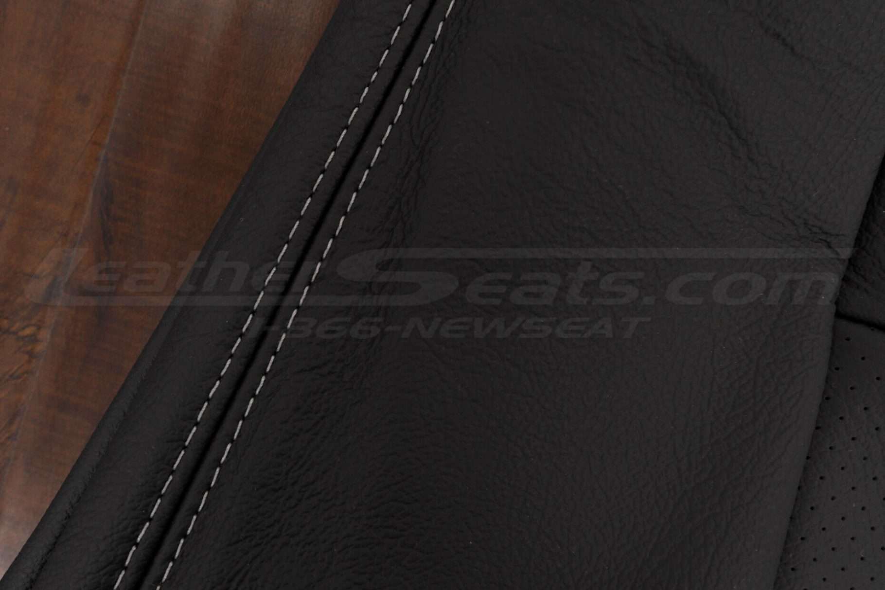 Contrasting Platinum thread on Black leather
