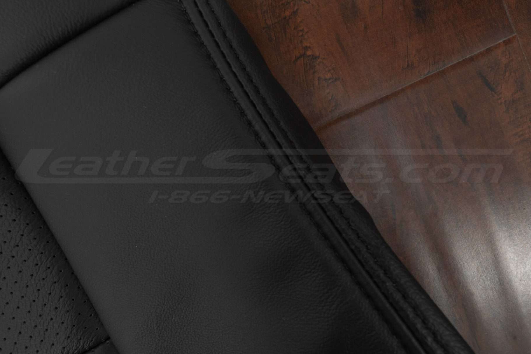 Matching Black double-stitching on Black leather