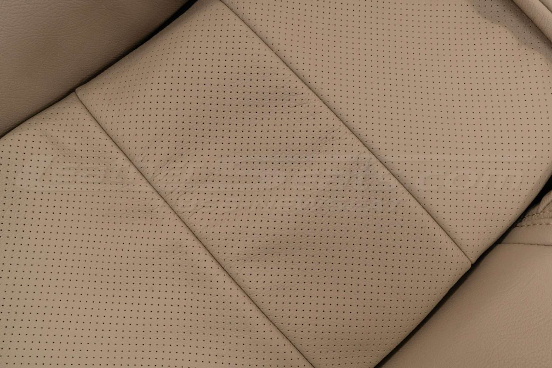 PErforated Inserts on Sandstone leather - close-up