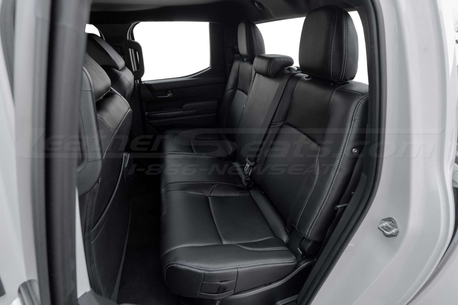 2024-2025 Toyota tacoma with black leather seats - rear seats installed