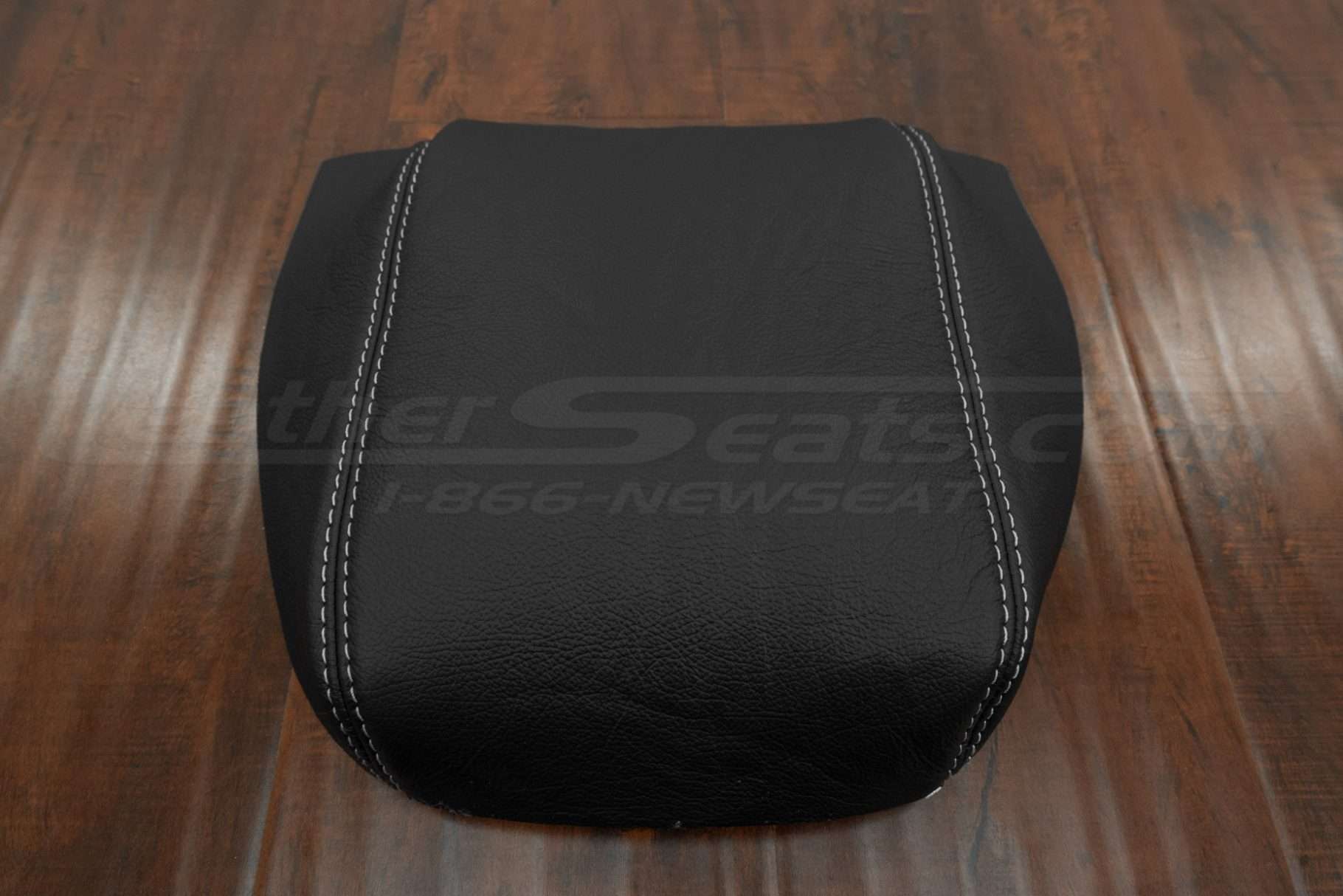 Straight on view of Toyota Tacoma leather console lid cover