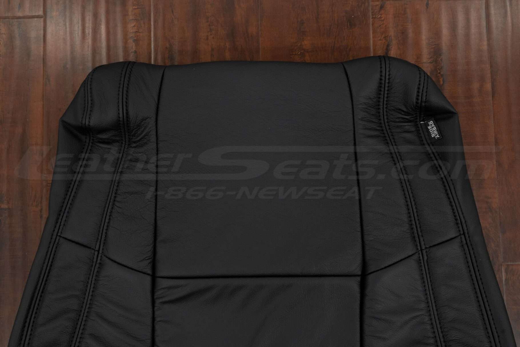Upper section of backrest upholstery